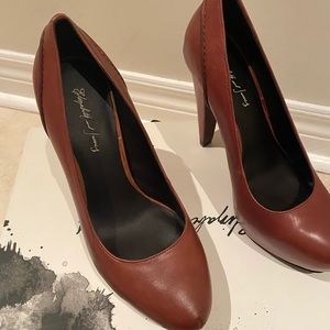 Brand new brown pumps platform